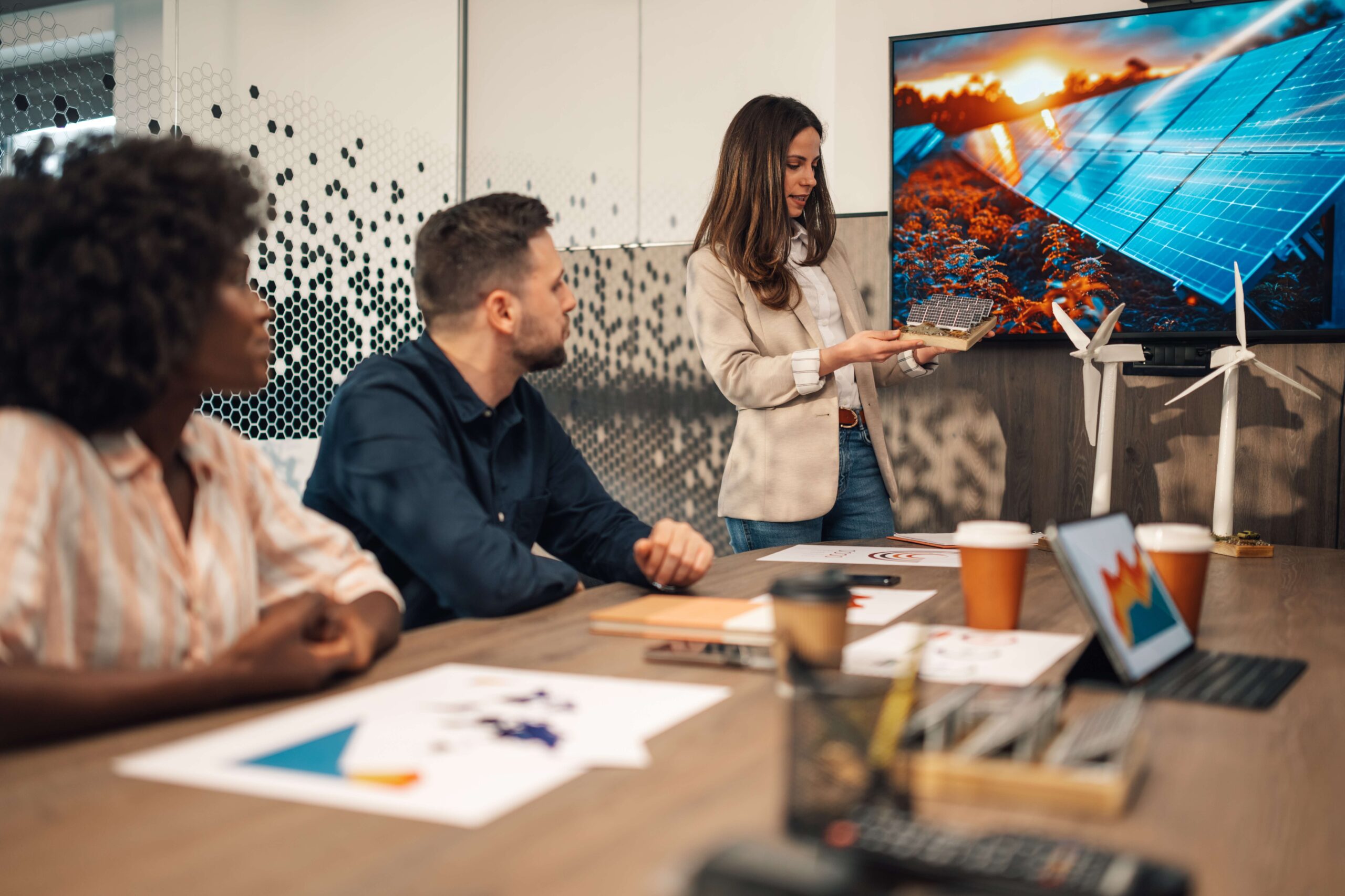 Team reviewing TV and OTT campaign results